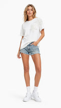 Women's embroidered flower t-shirt with cutwork floral design, front view model