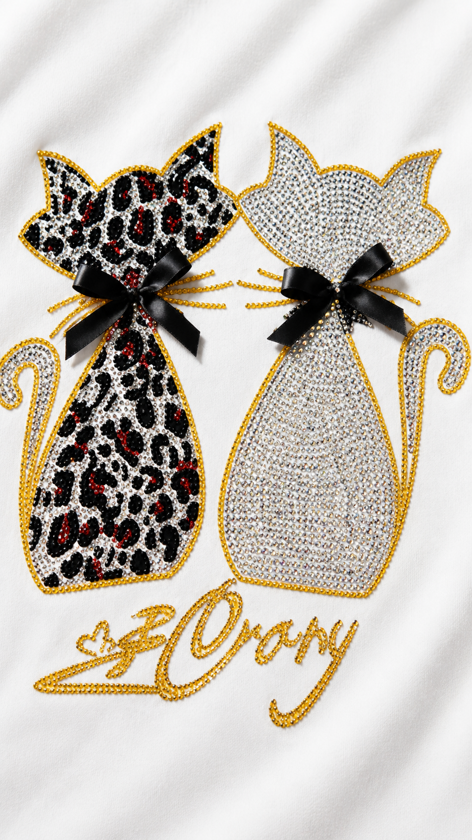 Close-up of rhinestone cat couple with bow and Lovely script on white t-shirt showing crystal detail