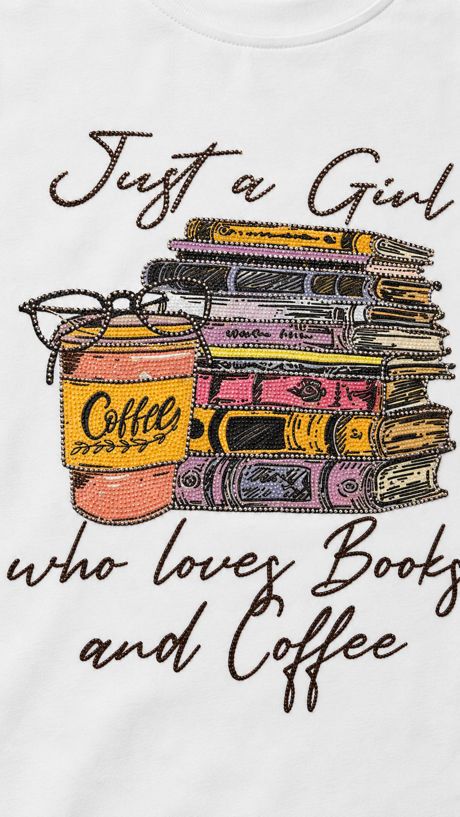 Close-up of rhinestone coffee house book stack with Just a Girl script on white t-shirt showing crystal detail
