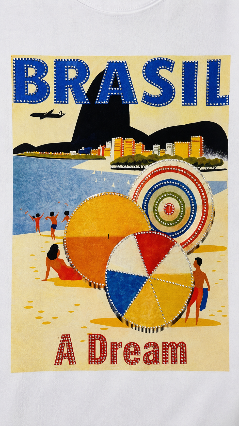 Close-up of rhinestone Brazil beach scene with palm tree and beach ball on white t-shirt showing crystal detail