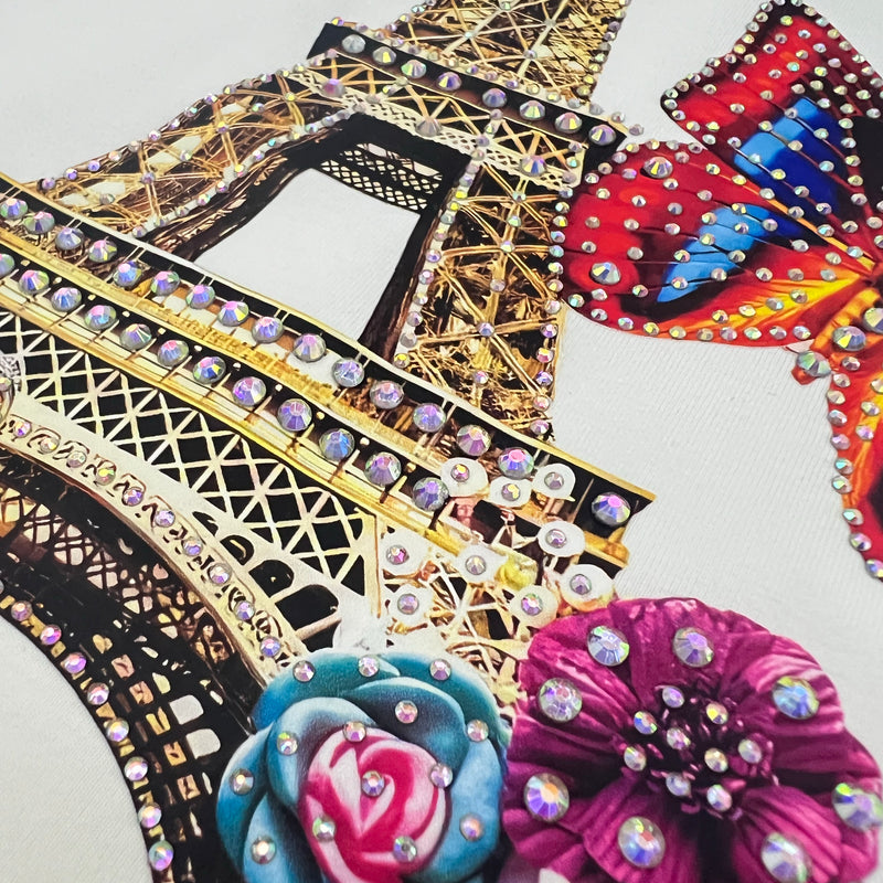 Hot-fix rhinestone application on women's T-shirt