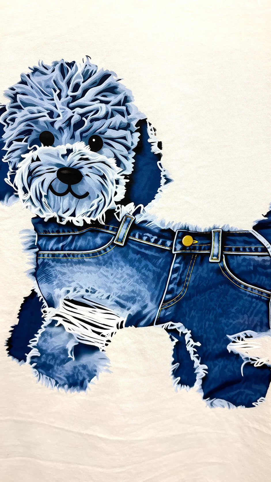 Close-up of blue poodle dog print design detail on t-shirt
