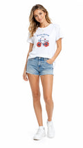 Women's embroidered Sunshine bicycle t-shirt with floral cutwork, front view model