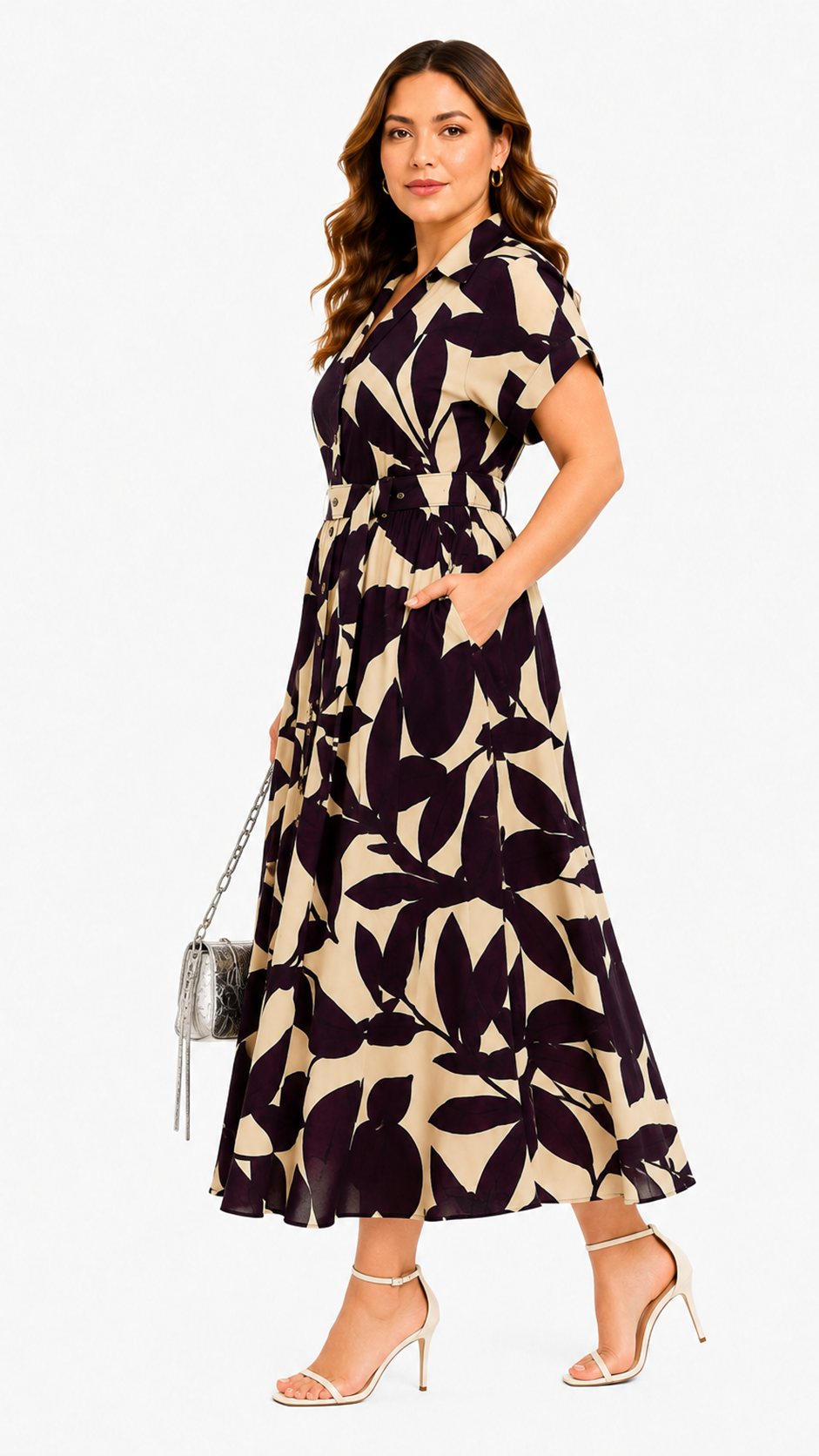 Side view of women's dark base floral print belted maxi dress