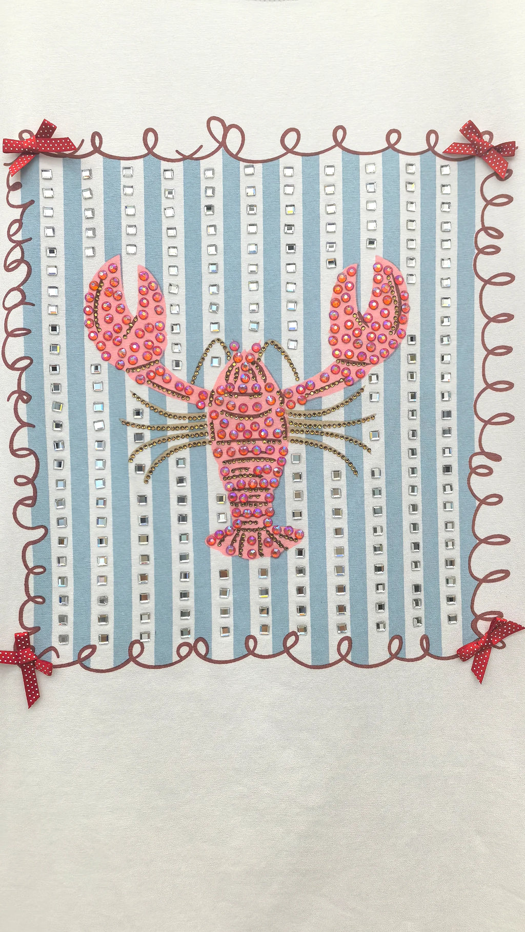 Close-up of intricate beadwork lobster design on t-shirt showing dense 3D bead embellishment detail